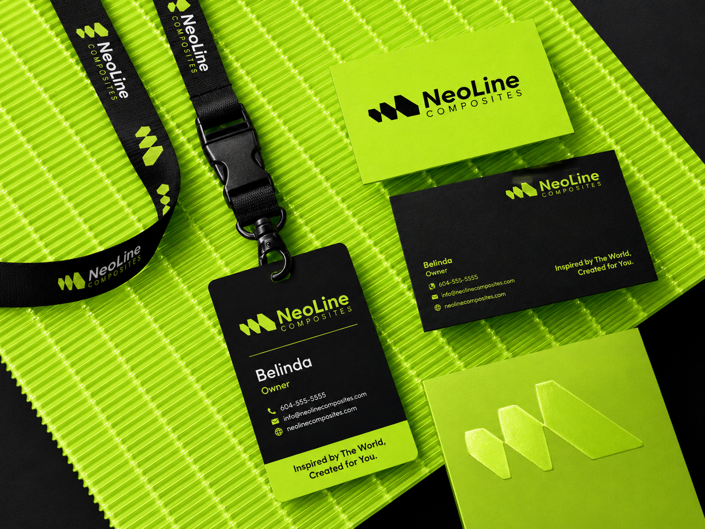 NeoLine Composites business cards, lanyard and ID badge on a lime background