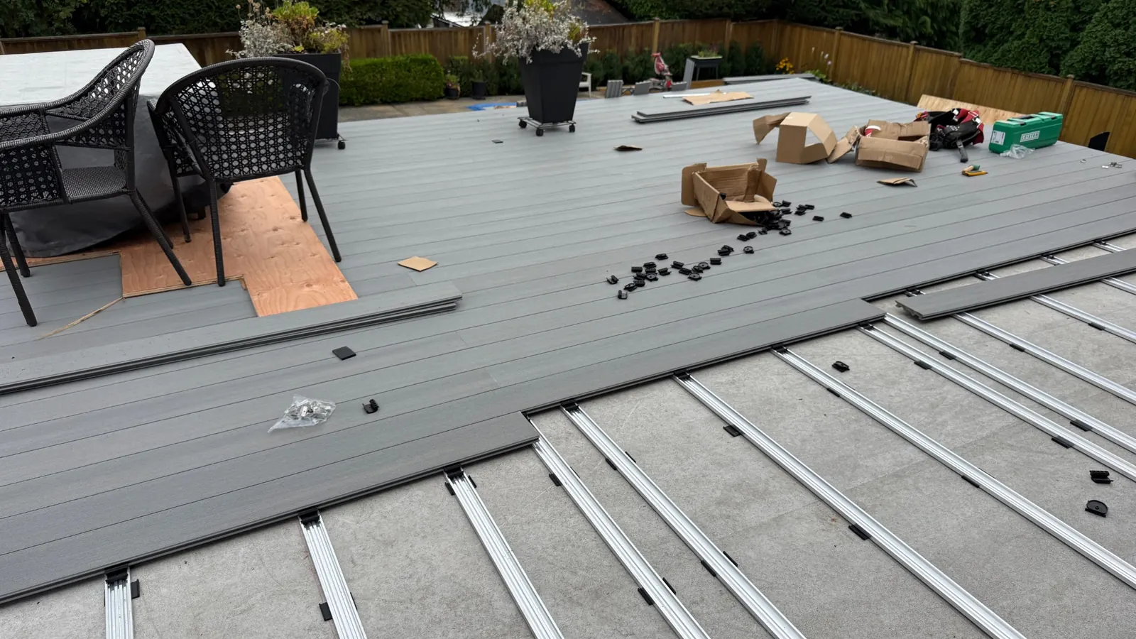 Aluminum sleepers and matching clips beneath partially installed NeoLine ZeroGap decking