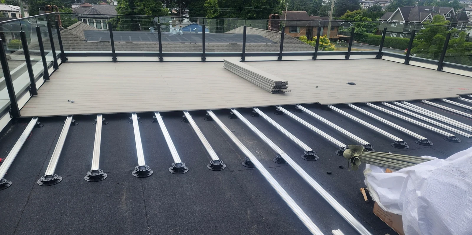 ZeroGap aluminum joists on adjustable pedestals with partially installed ZeroGap decking boards