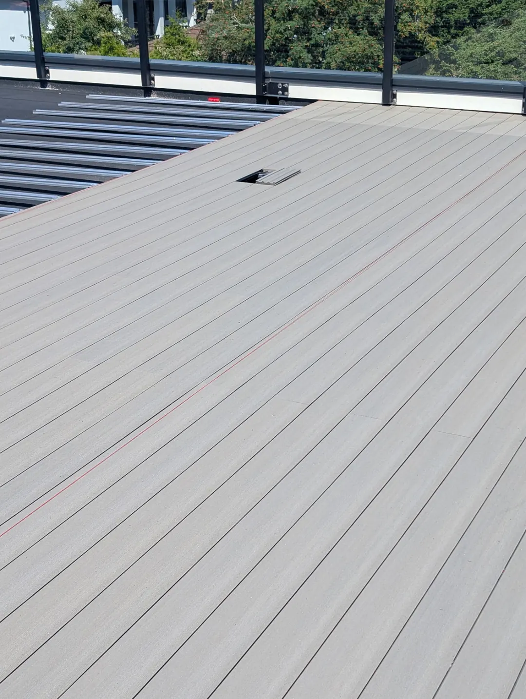 A close view of the laid ZeroGap boards beside an access opening.