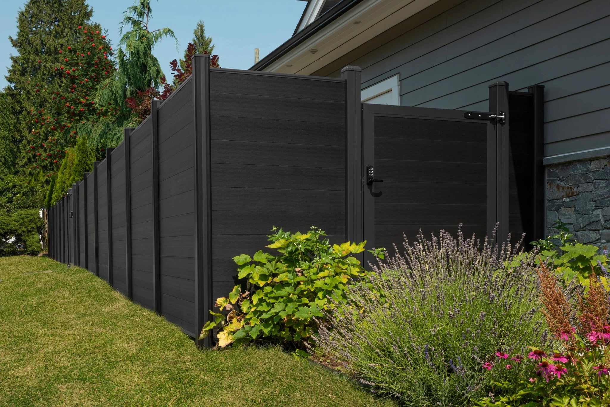 Onyx Black NeoLine fencing with matching composite posts at Garrow